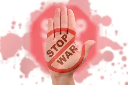 HD PC desktop wallpaper: an open hand with a red STOP WAR sign stamped on the palm against a peace-themed background, symbolizing no war.
