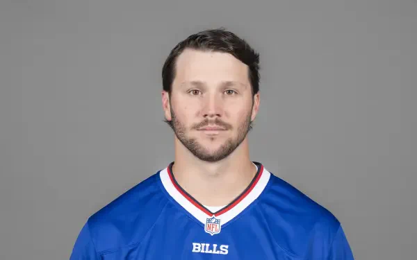 HD wallpaper featuring Buffalo Bills quarterback Josh Allen in his team jersey, showcasing the spirit of NFL football.