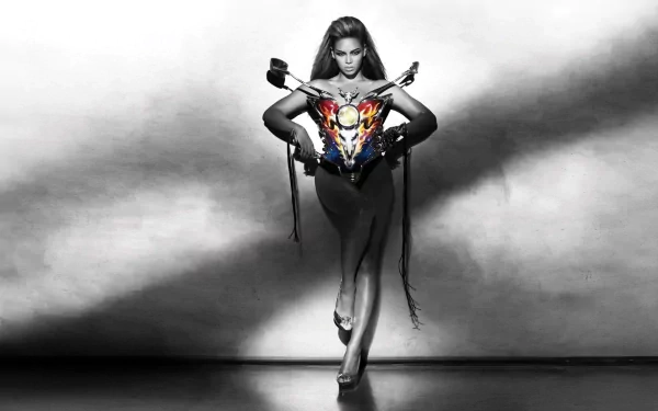 HD music-themed PC wallpaper: dramatic black-and-white portrait of a female performer striding forward, holding a colorful ornate chestpiece against a smoky stage backdrop.