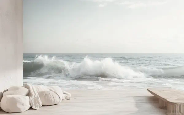 A serene indoor room with a white aesthetic overlooking crashing ocean waves, captured in HD as a calming desktop wallpaper and background.