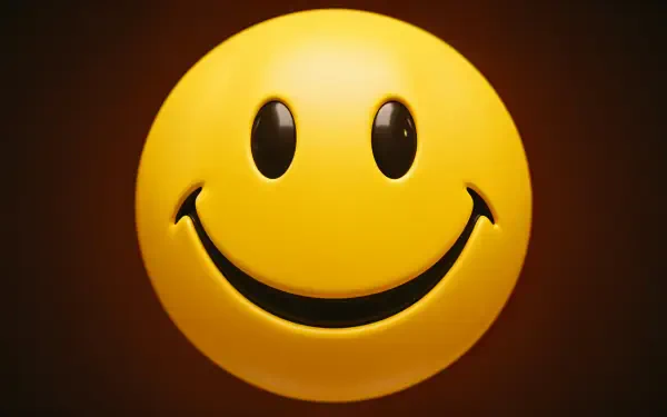 A vibrant yellow smiley face with large black eyes and a broad smile, set against a dark background. This image serves as a cheerful 4K Ultra HD desktop wallpaper.