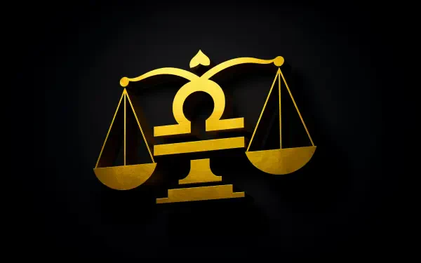 4K Ultra HD wallpaper featuring a golden Libra astrology symbol with balanced scales on a black background for PC desktop.