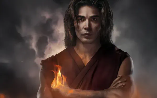 4K Ultra HD PC desktop wallpaper of a Mortal Kombat 2 (2025) character with intense expression, dark background, and flames in hand.