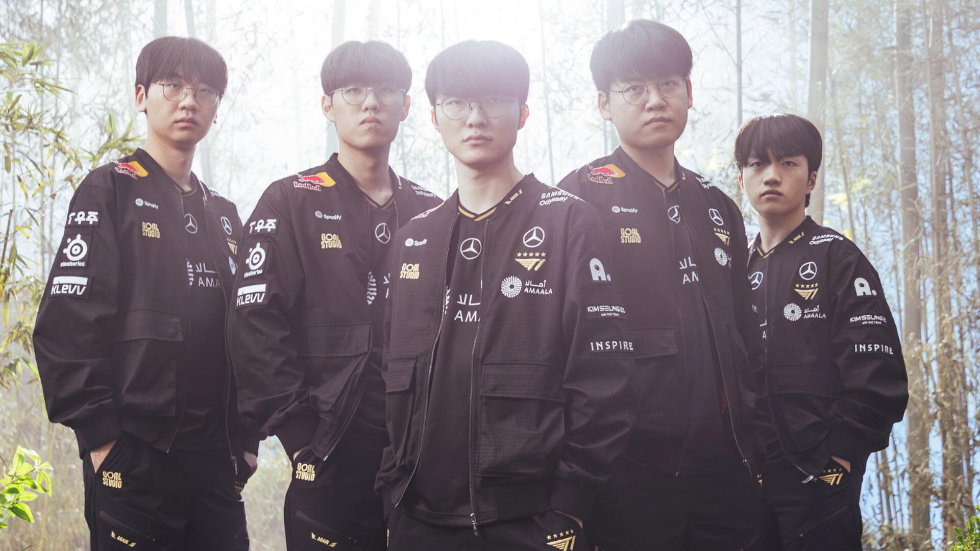HD desktop wallpaper of a professional League of Legends esports team in branded jerseys standing together against a misty forest backdrop.