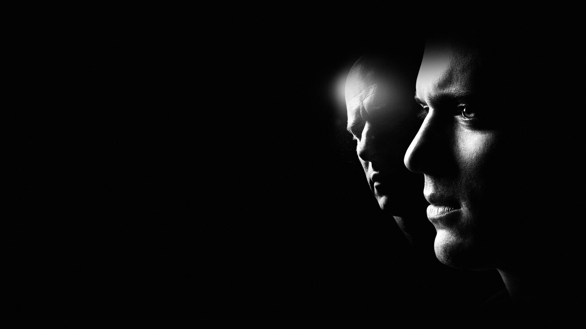 Prison Break 4K Ultra HD PC desktop wallpaper: stark black-and-white profiles of two faces emerging from deep shadow, cinematic and tense atmosphere.