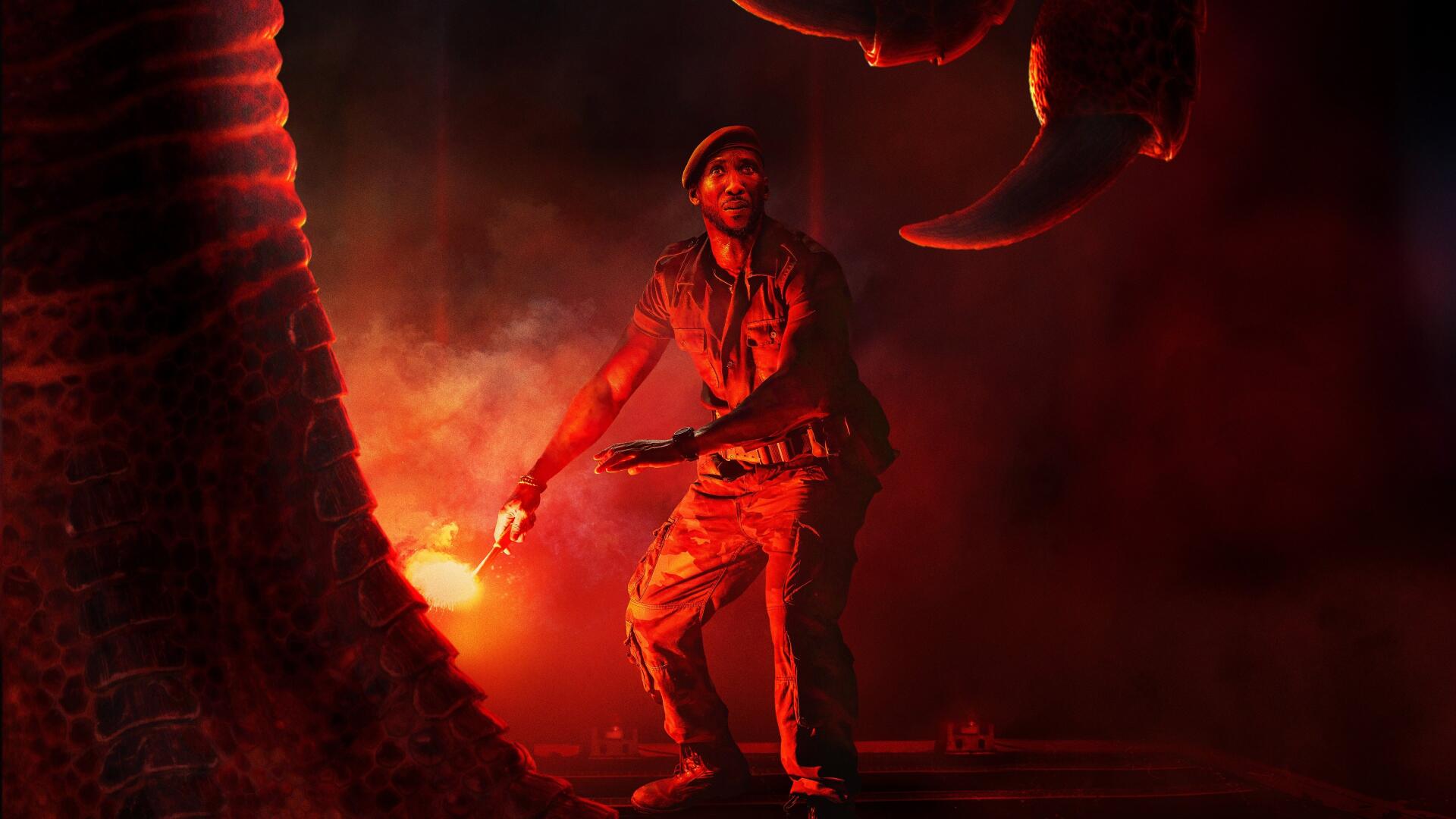 Jurassic World Rebirth 4K Ultra HD PC desktop wallpaper: ranger with a red flare confronting massive dinosaur claws amid smoky, cinematic red lighting