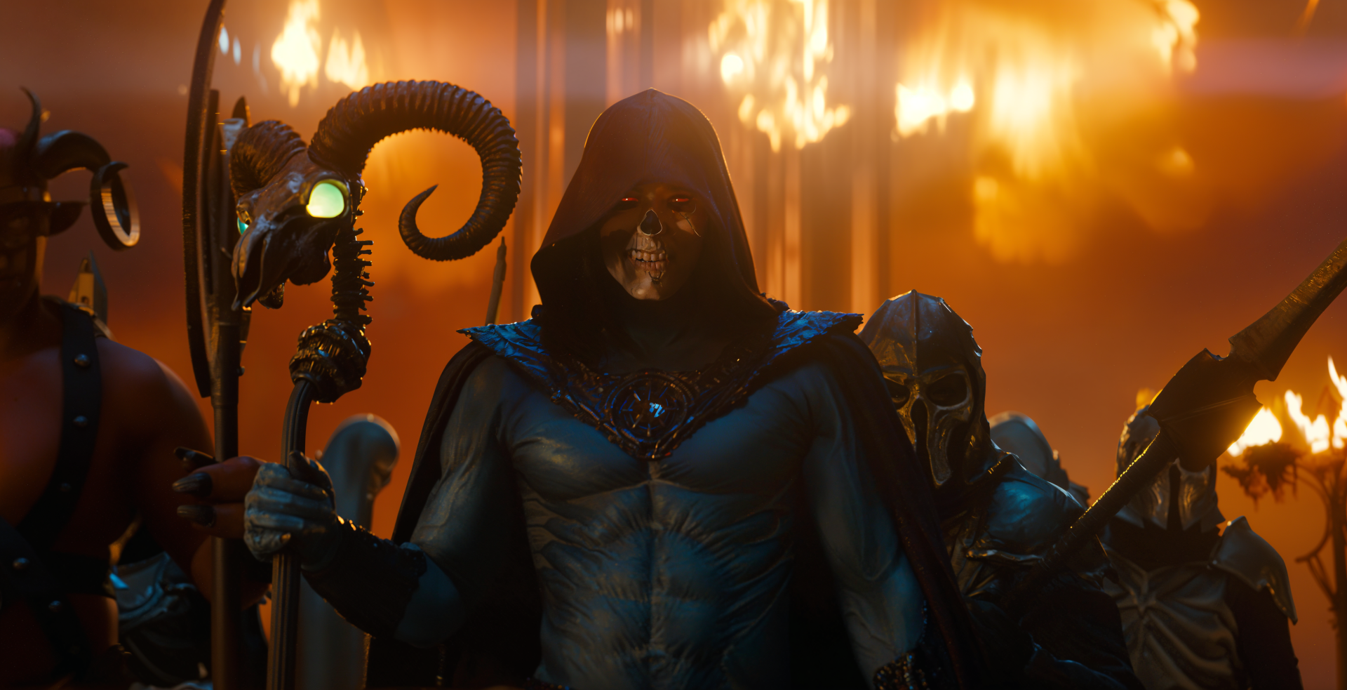 Hooded Skeletor in dark armor grips a ram‑headed staff amid roaring flames — cinematic still from Masters of the Universe (2026). 4K Ultra HD PC desktop wallpaper/background.