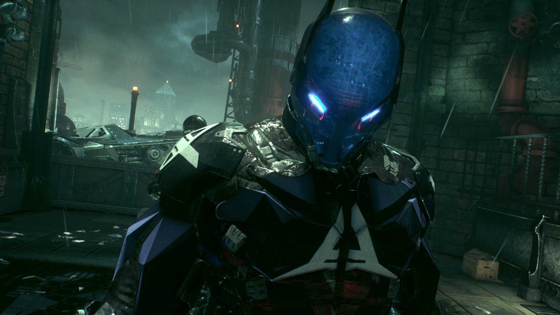 HD PC wallpaper — Action-Adventure Batman: Arkham Knight featuring Jason Todd as the armored, blue-lit Arkham Knight standing amid rain-soaked, industrial Gotham rooftops.