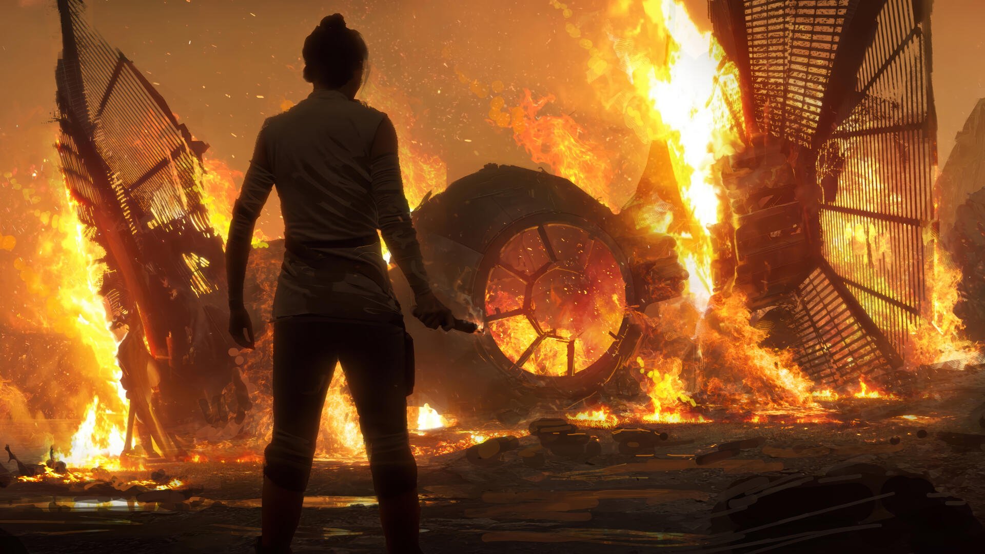 Star Wars 4K Ultra HD desktop wallpaper: Rey silhouetted against roaring fires, facing the charred wreckage of a TIE Fighter.