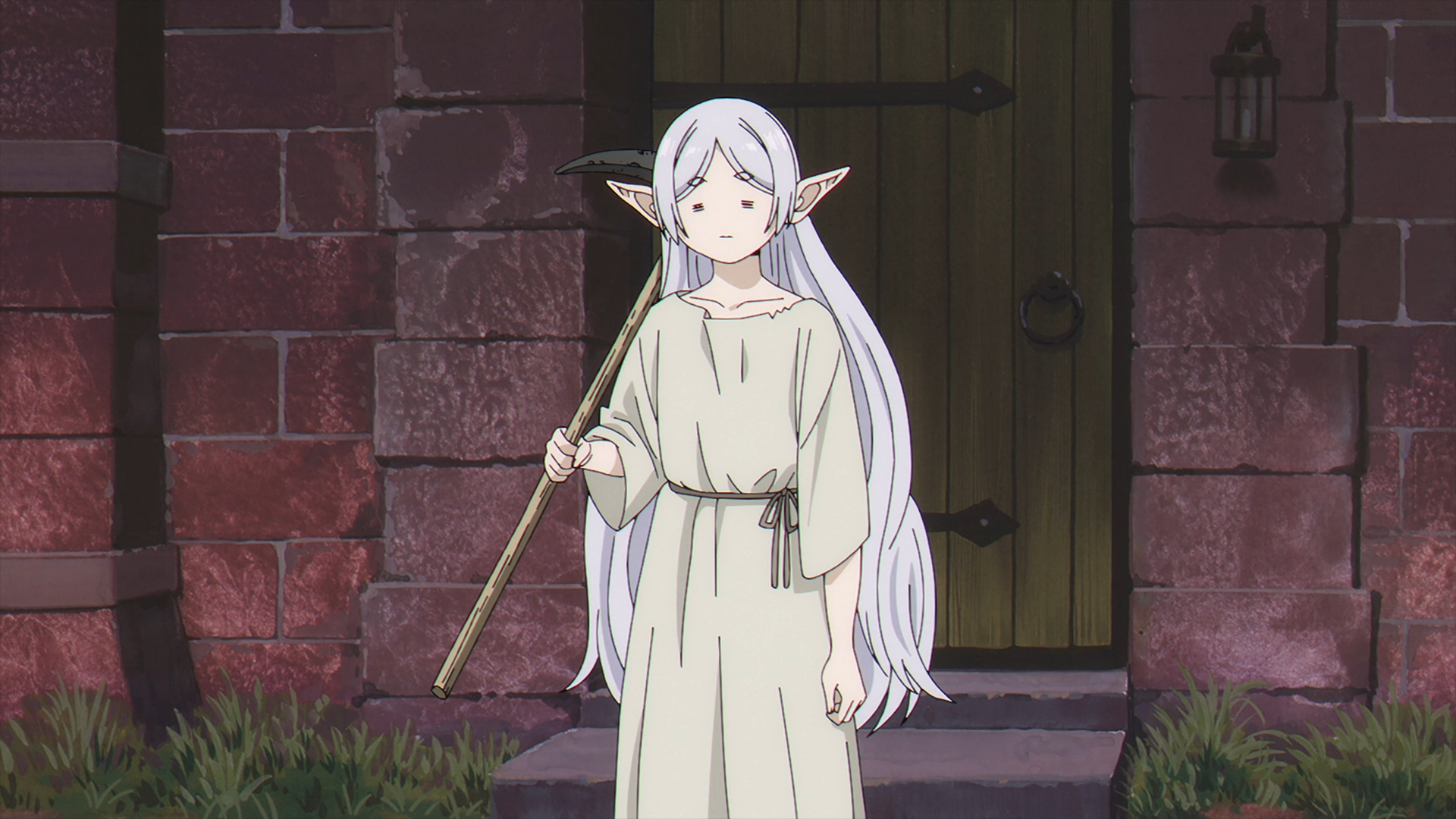 Anime HD desktop wallpaper of Frieren (Frieren: Beyond Journey's End) standing in a simple robe by a stone doorway, long white hair, elven ears and a calm, serene expression.