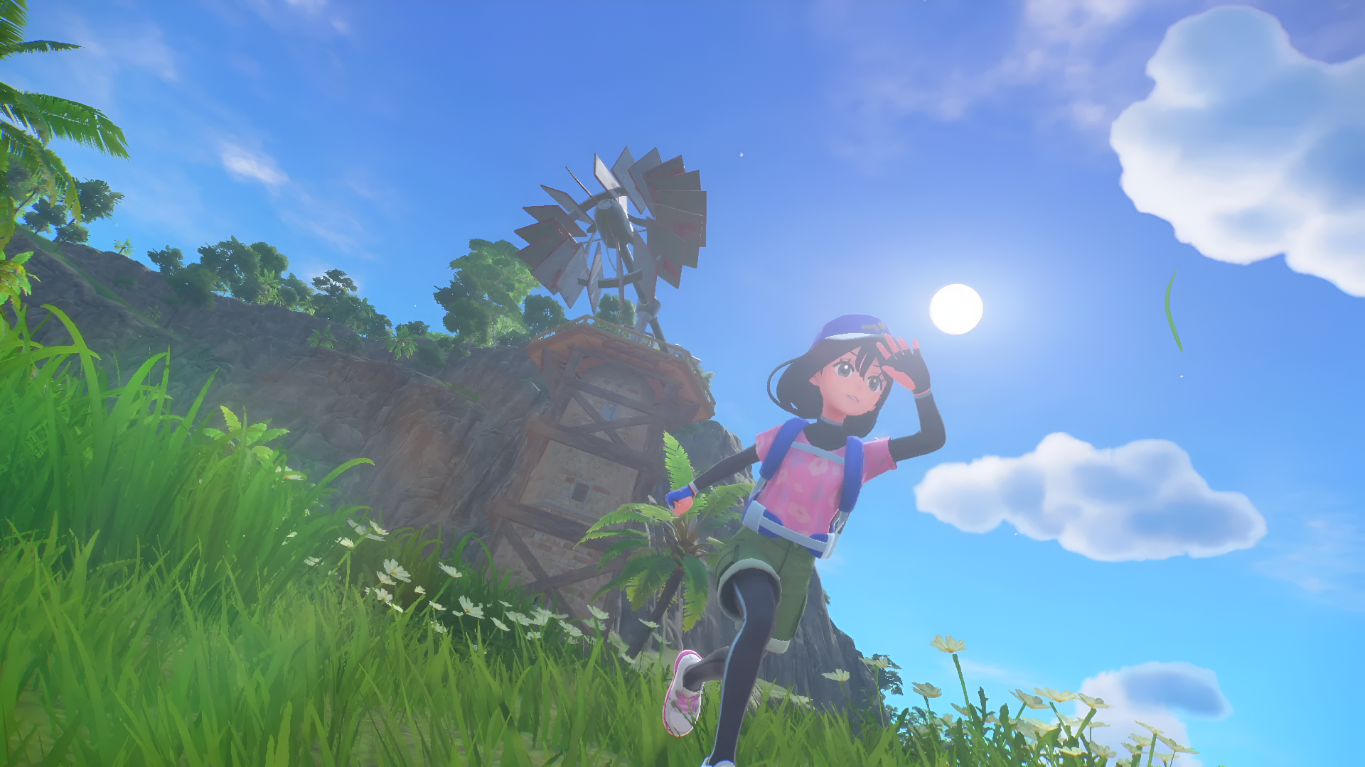 4K Ultra HD PC desktop wallpaper: Pokémon Winds and Waves (Nintendo Switch 2) screenshot of a cyclist trainer shading their eyes on a grassy hillside with a windmill, sunlit blue sky and clouds.