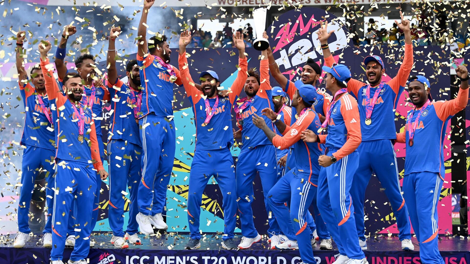 4K Ultra HD PC desktop wallpaper: Indian cricket team celebrating on the podium with trophy and confetti, ICC Champions Trophy and ICC Men's T20 World Cup banners in the background.