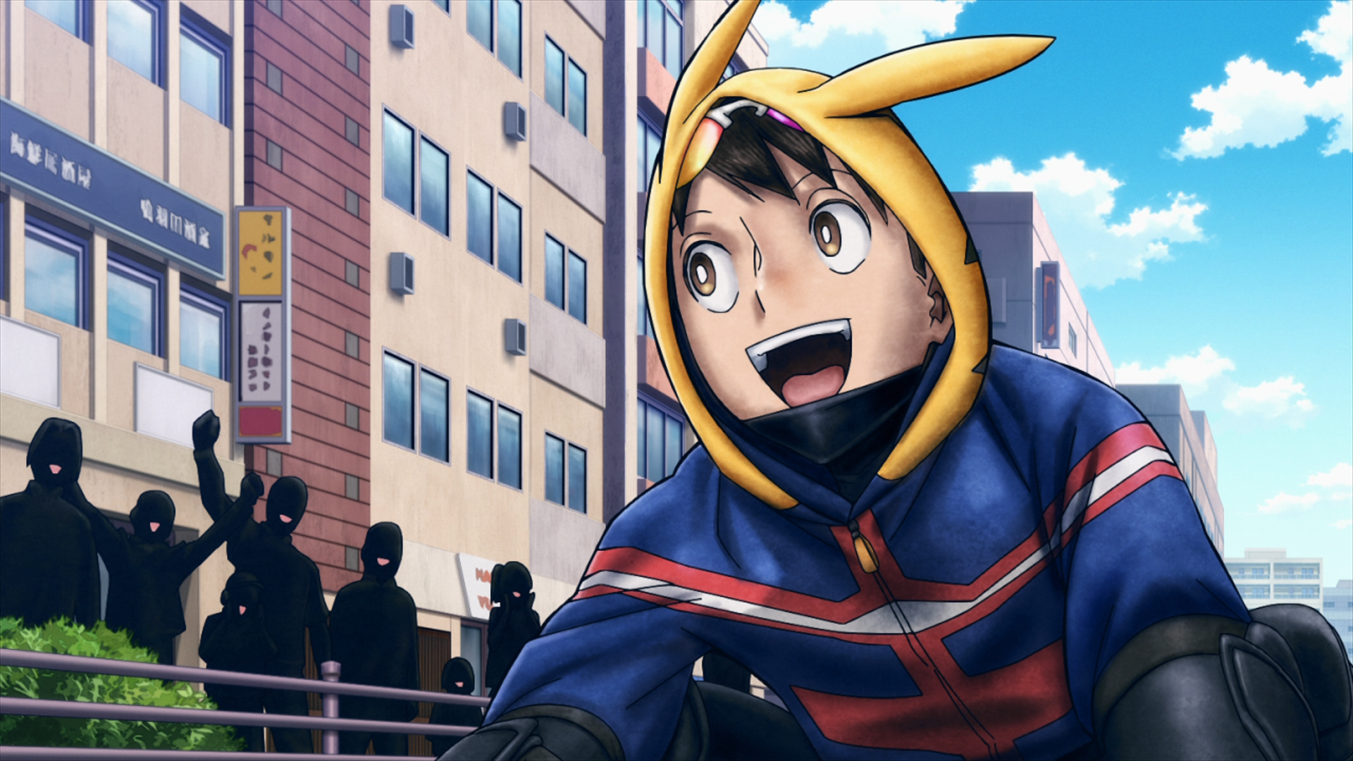 HD PC anime desktop wallpaper of Koichi Haimawari from My Hero Academia: Vigilantes, wearing a yellow-eared hood and smiling on a sunny city street.