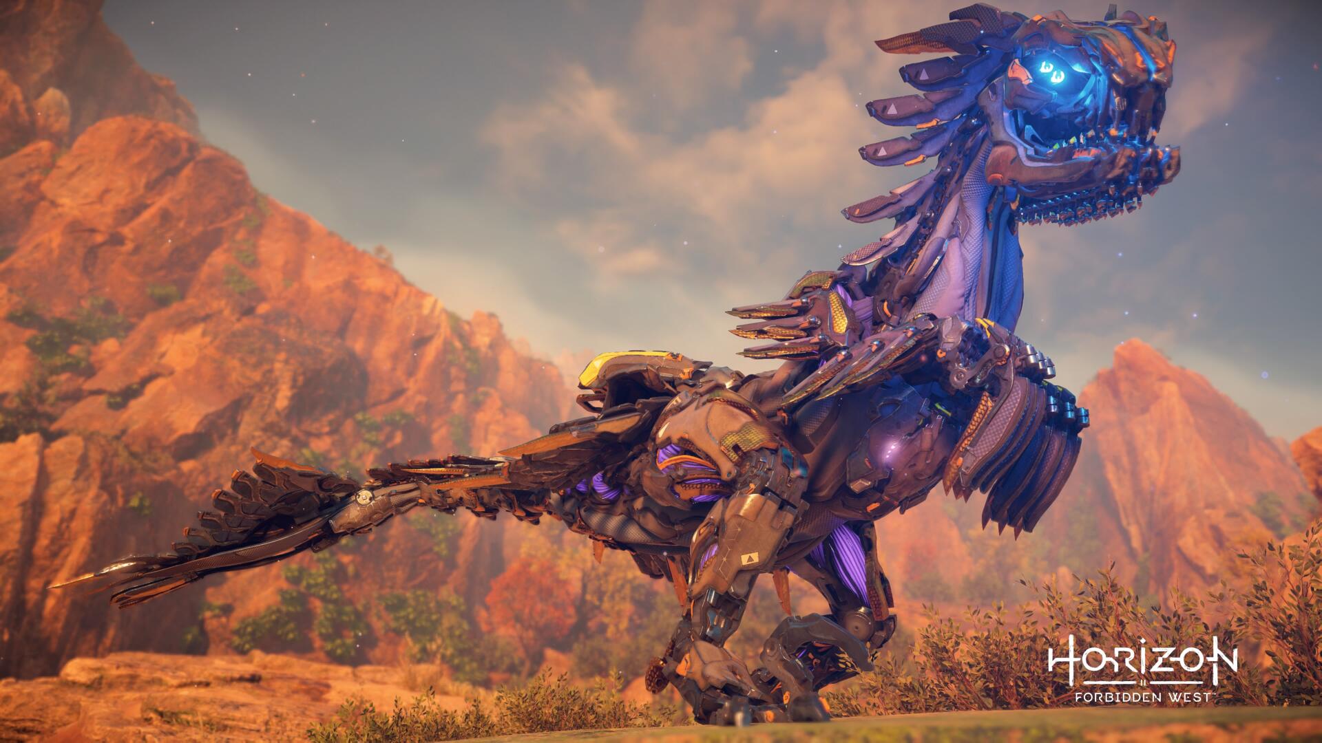 Horizon Forbidden West 4K Ultra HD PC desktop wallpaper: a glowing blue-eyed machine raptor prowls a sunlit red-rock canyon.
