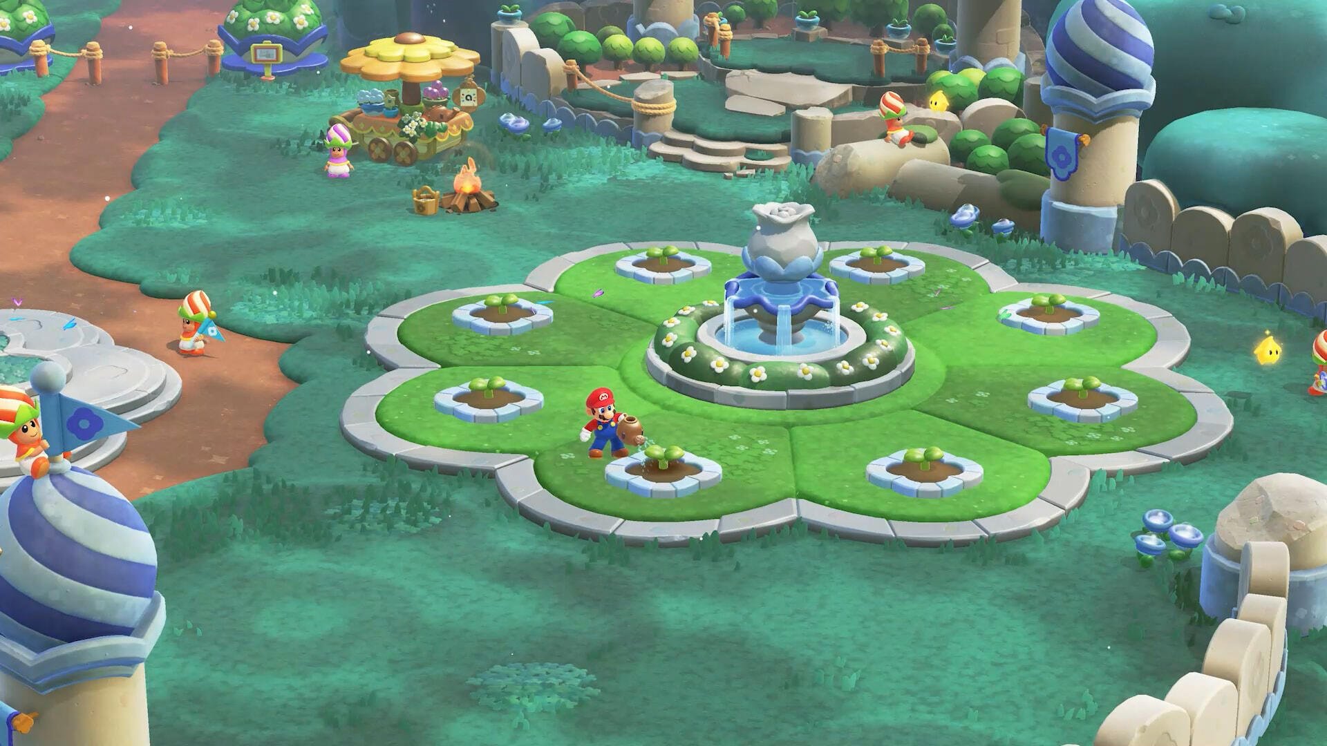 Super Mario Bros. Wonder HD PC desktop wallpaper/background showing Mario by a clover-shaped fountain plaza amid colorful mushroom buildings and lush green lawns.