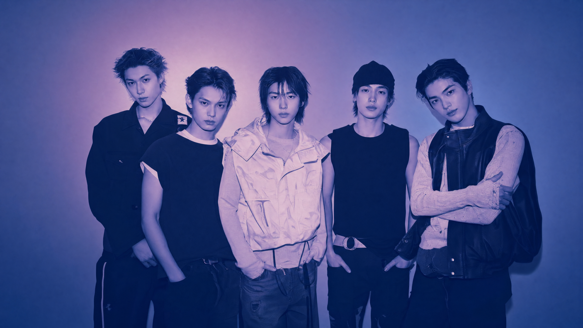 4K Ultra HD PC desktop wallpaper titled Cortis — five young men in moody blue-purple studio lighting, casual fashion and relaxed poses, cinematic, band-style portrait.