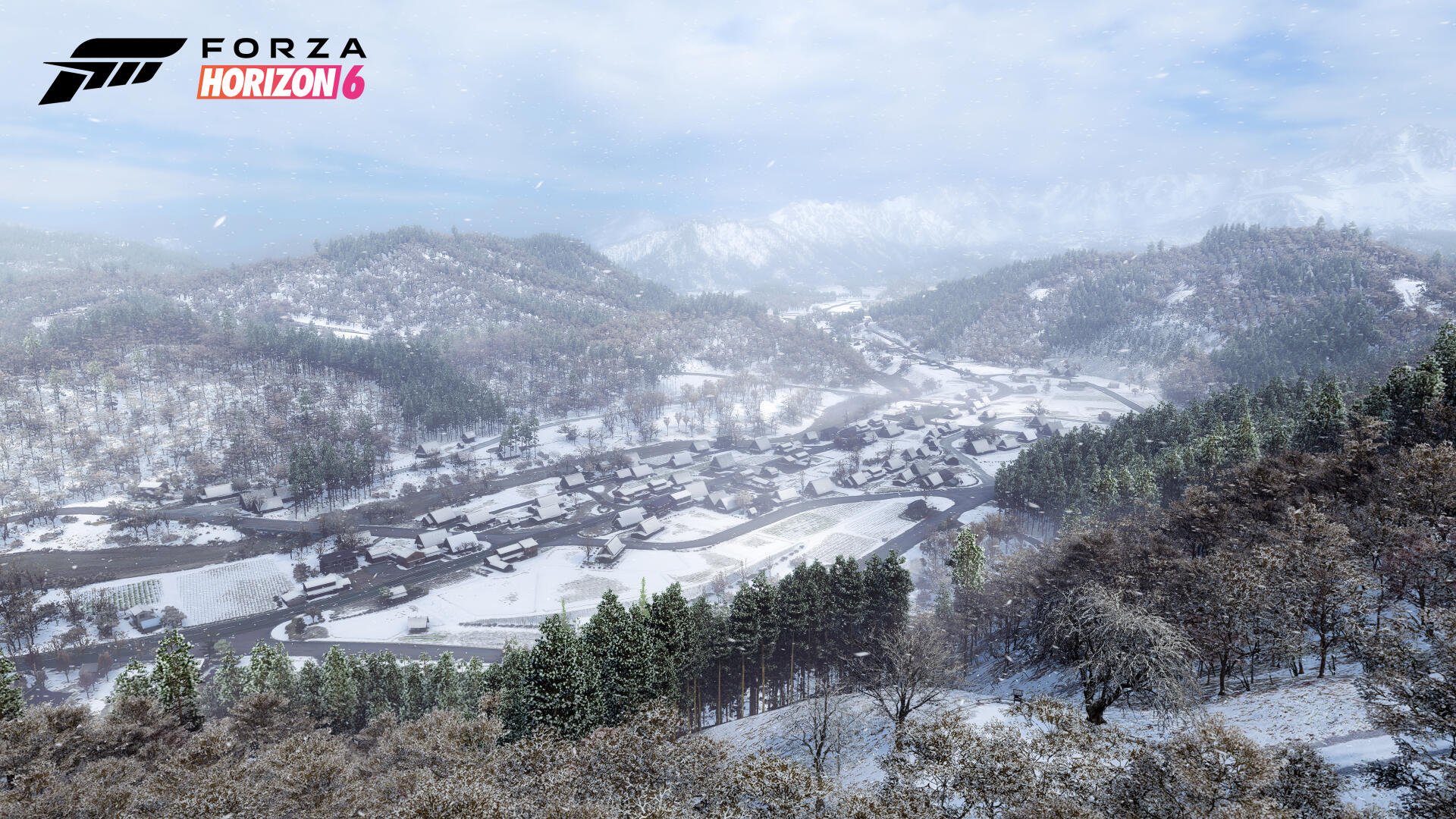 Forza Horizon 6 video game 4K Ultra HD PC wallpaper: panoramic snowy valley with village, winding road and pine forests beneath a cloudy sky.