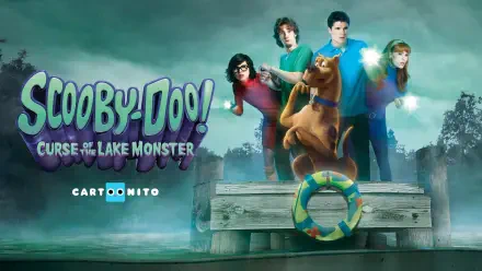 HD PC desktop wallpaper/background: Scooby-Doo! Curse of the Lake Monster — Scooby and the gang on a foggy dock, Scooby front and center with a lifebuoy and a spooky lake castle behind them.