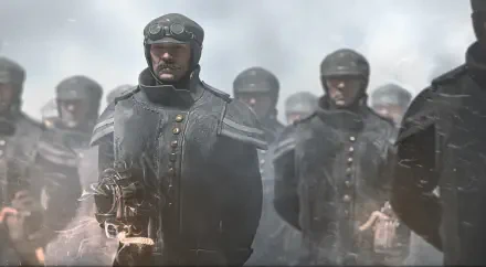 Frostpunk 2 video game HD PC desktop wallpaper: armored soldiers march through a blizzard, a goggled lead officer holding a glowing mechanical device at the front.