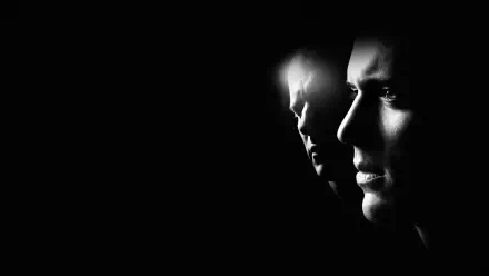 Prison Break 4K Ultra HD PC desktop wallpaper: stark black-and-white profiles of two faces emerging from deep shadow, cinematic and tense atmosphere.