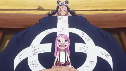 HD PC wallpaper of One Piece: giant Bartholomew Kuma looming behind smiling Jewelry Bonney, Kuma's bold white cross emblem on his coat against a wooden background.