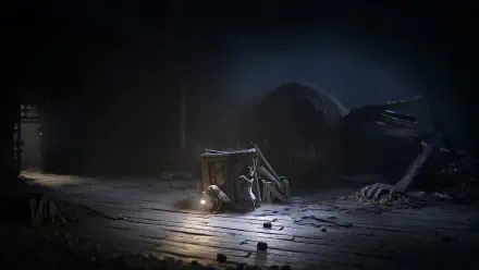 Reanimal HD PC desktop wallpaper showing a dim wooden floor, a small lantern-lit cart and a looming shadowy, root-like creature in the background.