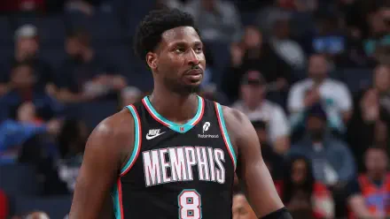 HD PC wallpaper: NBA Memphis Grizzlies player in black MEMPHIS jersey #8 on the court, focused during a basketball game.