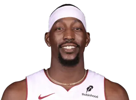 HD desktop wallpaper: smiling basketball player in a Miami Heat jersey on a dark background, NBA-themed portrait.