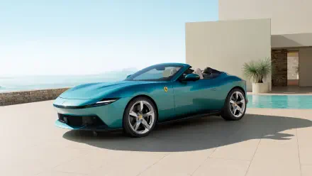 Teal Ferrari Amalfi Spider car convertible parked on a sunlit modern terrace by a pool and sea, 4K Ultra HD PC desktop wallpaper.