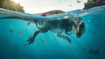 Prehistoric Planet 4K Ultra HD PC Desktop Wallpaper and Background: a large theropod dinosaur swimming just below the waterline, fish nearby and pterosaurs soaring overhead.