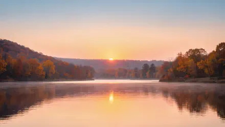 4K Ultra HD PC desktop wallpaper and background: serene fall sunset over a misty lake, golden trees reflected in calm water.