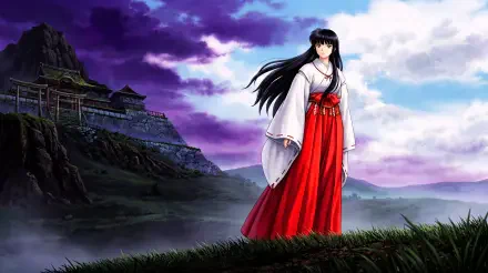 Kikyō (InuYasha), a fantasy anime priestess in white kimono and red hakama, stands on a grassy hill before a feudal Japan fortress under a purple-blue sky — 5K Ultra HD PC wallpaper.