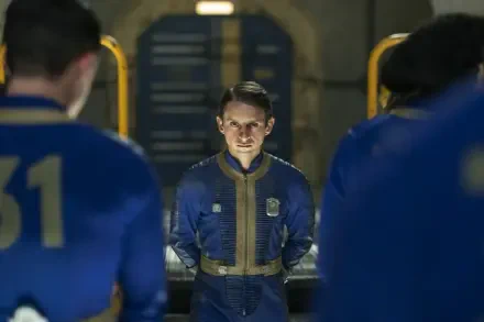 Fallout (TV Show) — Vault jumpsuit-clad character stares ahead in a dim Vault-Tec chamber, flanked by others; HD PC desktop wallpaper and background.