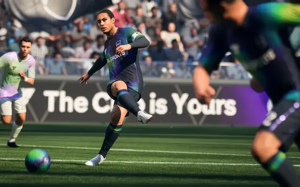 EA Sports FC 26 video game 4K Ultra HD PC desktop wallpaper: a towering center-back powers a shot in a packed stadium, realistic player detail and dynamic motion blur.