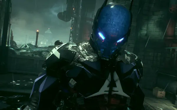 HD PC wallpaper — Action-Adventure Batman: Arkham Knight featuring Jason Todd as the armored, blue-lit Arkham Knight standing amid rain-soaked, industrial Gotham rooftops.