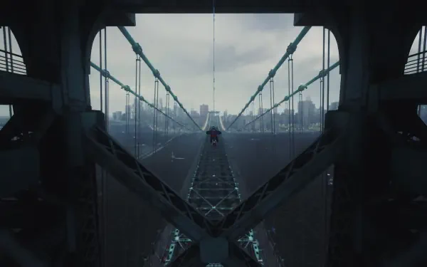 Marvel's Spider-Man 2 action-adventure 4K Ultra HD PC desktop wallpaper: Spider-Man perched on a misty suspension-bridge truss, city skyline fading into fog under an overcast sky.