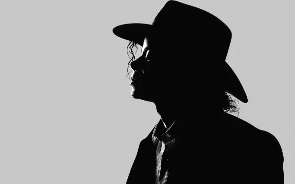 Shadow silhouette of a fedora-wearing male musician in profile on a gray background, 2K Quad HD PC desktop wallpaper.