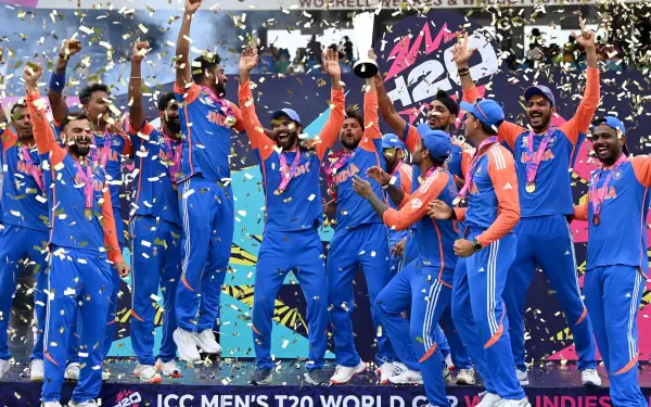 4K Ultra HD PC desktop wallpaper: Indian cricket team celebrating on the podium with trophy and confetti, ICC Champions Trophy and ICC Men's T20 World Cup banners in the background.