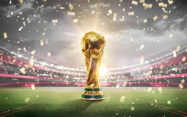 FIFA World Cup 2026 trophy glows on the stadium pitch amid flying confetti, 4K Ultra HD PC desktop wallpaper and background.