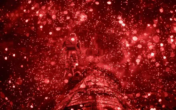Red HD PC desktop wallpaper showing an astronaut aboard a spacecraft amid sparkling red space — cinematic scene from the movie Project Hail Mary.
