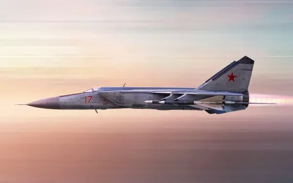 Side view of a Russian Air Force Mikoyan-Gurevich MiG-25 jet fighter in flight over a pastel sky; 4K Ultra HD military aircraft desktop wallpaper.