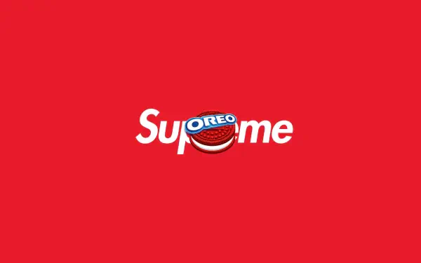 Minimalist red 8K desktop wallpaper featuring a Supreme logo with an Oreo cookie replacing the 'r' — a Supreme × Oreo crossover.