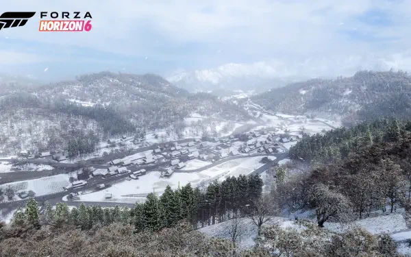 Forza Horizon 6 video game 4K Ultra HD PC wallpaper: panoramic snowy valley with village, winding road and pine forests beneath a cloudy sky.