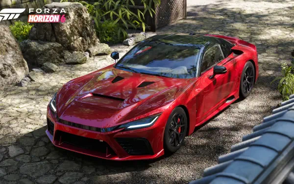 Forza Horizon 6 video game 4K Ultra HD PC desktop wallpaper/background: a glossy red sports car on a sunlit stone road surrounded by tropical foliage, high-detail racing scene with Forza logo.