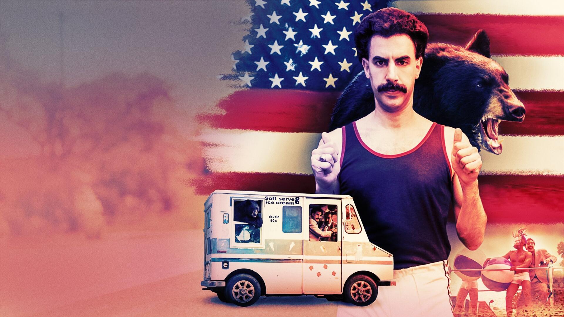 Borat Subsequent Moviefilm HD PC desktop wallpaper: mustachioed Borat in a tank top with backpack, U.S. flag backdrop, roaring bear and small ice-cream van.