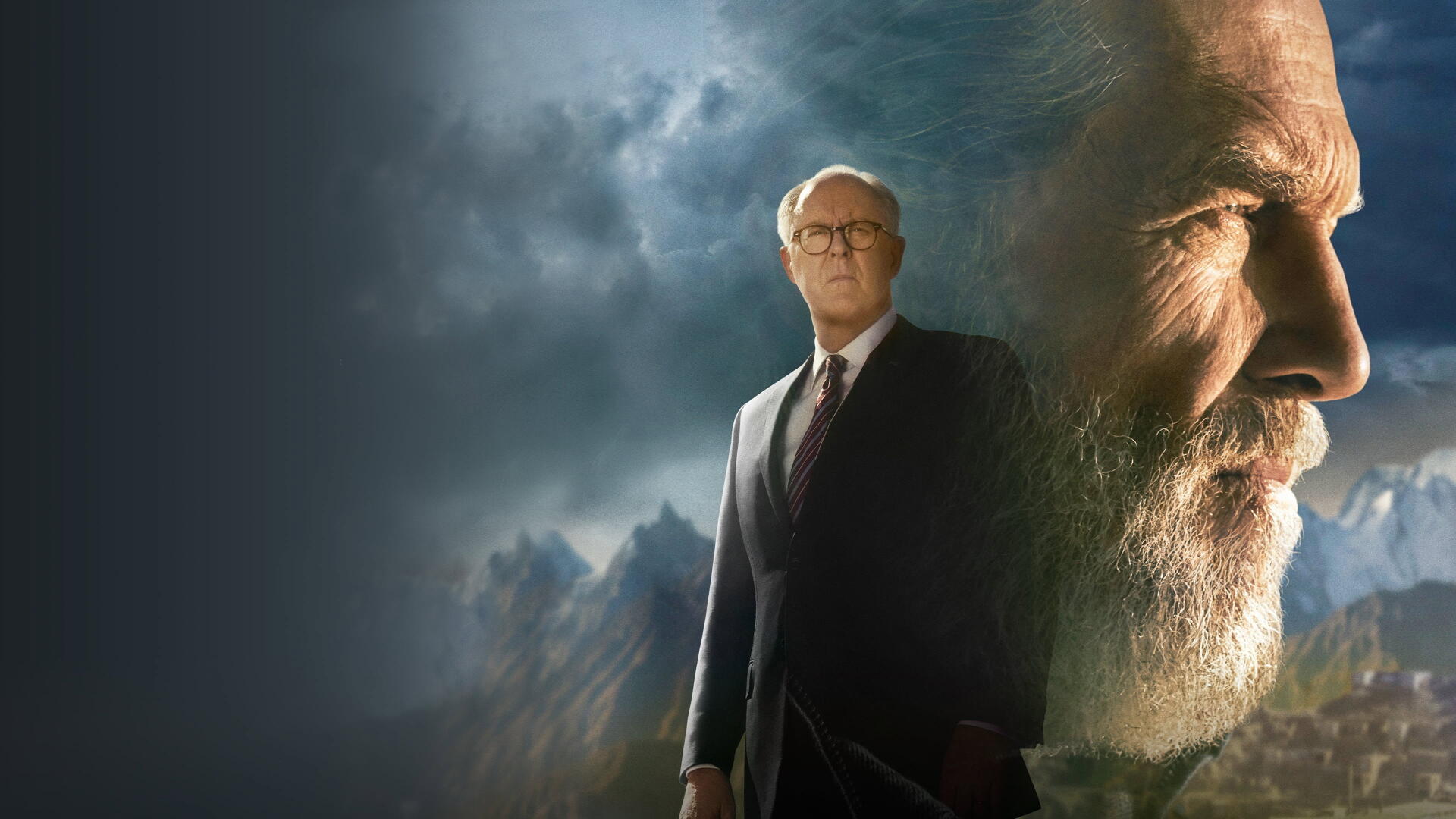 4K Ultra HD PC desktop wallpaper titled The Old Man — close-up bearded old man's profile and a full-body suited figure set against moody, stormy clouds and mountains.