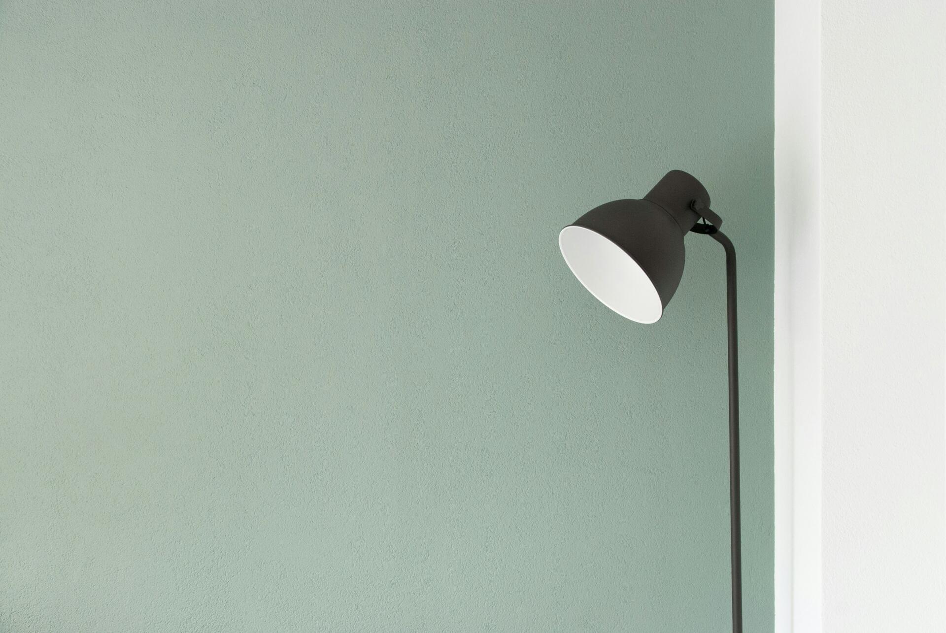 Minimal electric yellow aesthetic floor lamp against a pale muted wall — 4K Ultra HD PC desktop wallpaper and background.