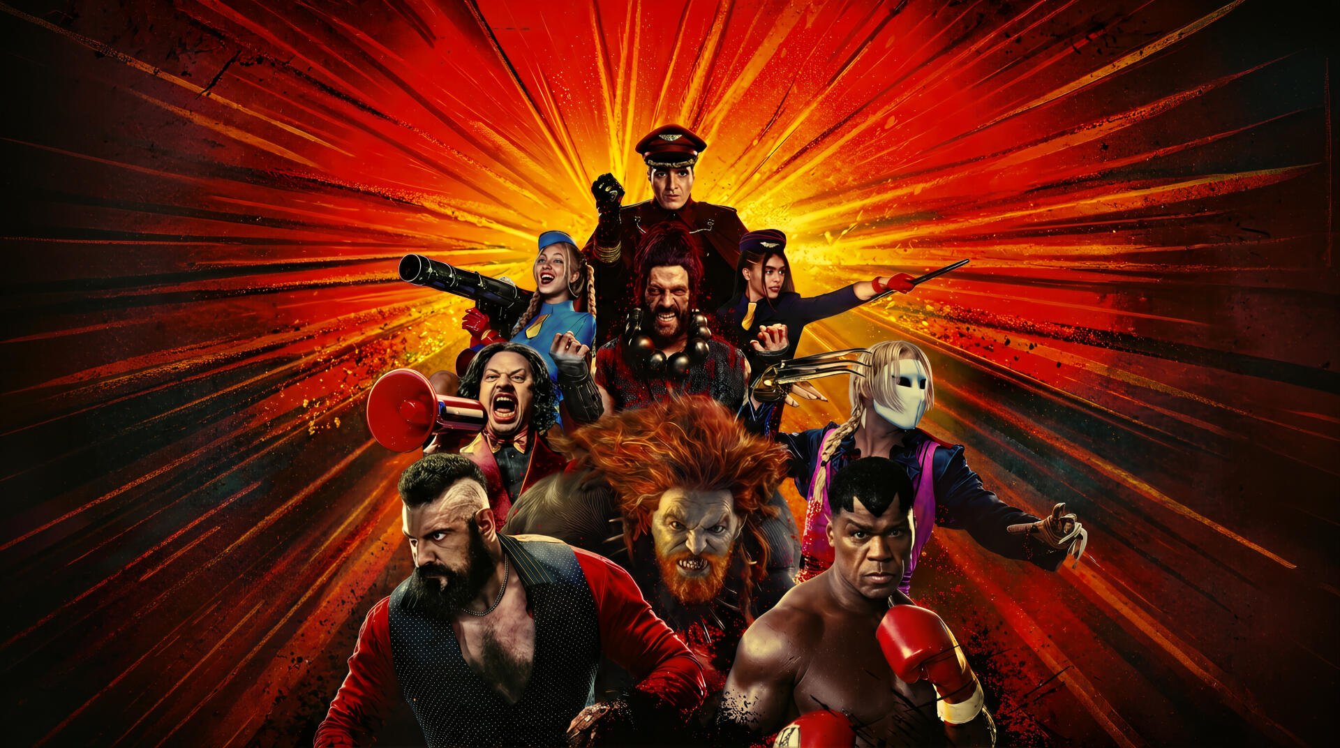 Street Fighter (2026) 2K Quad HD PC desktop wallpaper and background: group of Street Fighter characters in dynamic poses against a fiery red radial burst.