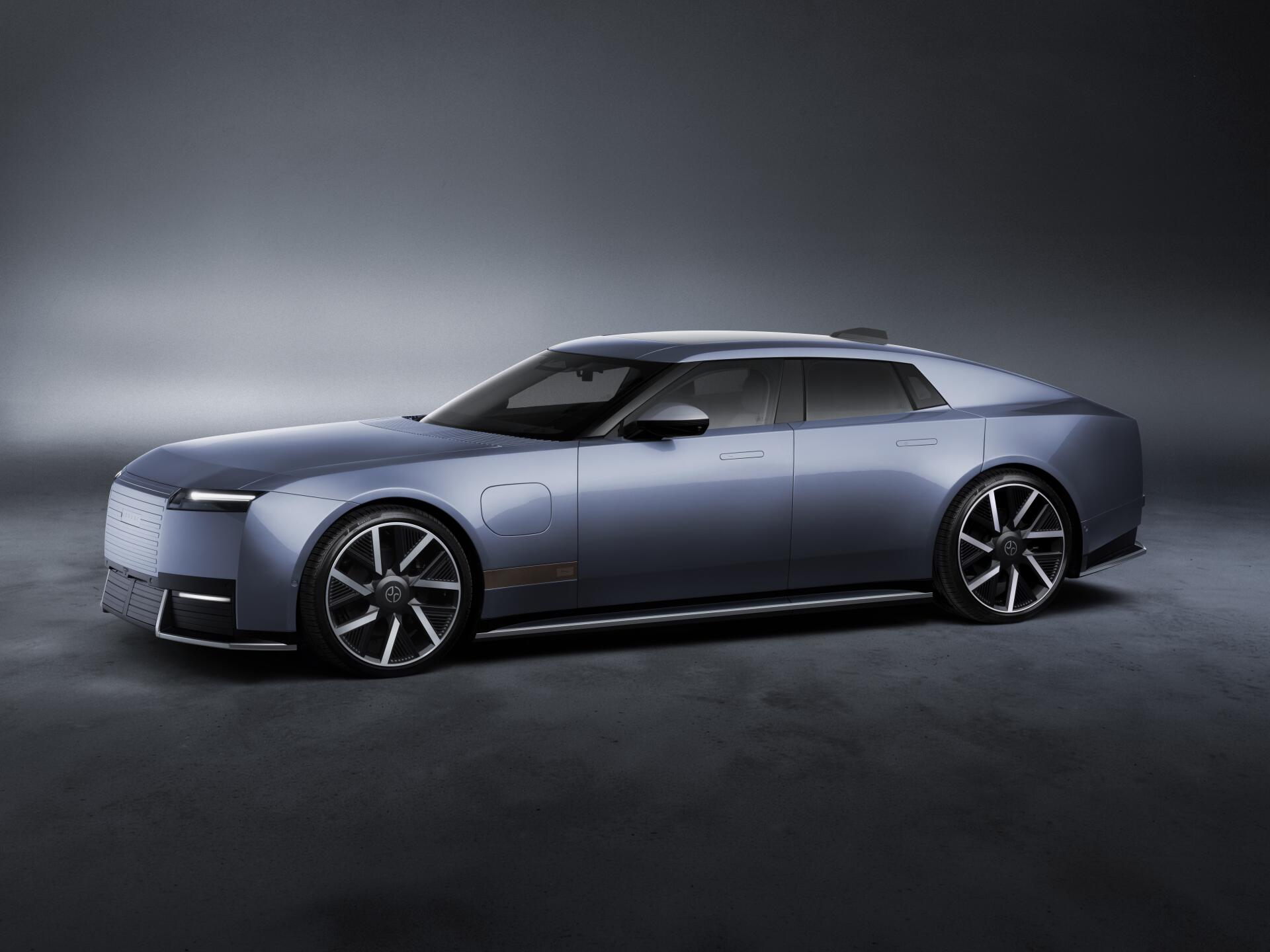 Jaguar Type 01 electric concept car in a sleek studio setting, 8K Ultra HD desktop wallpaper and background.