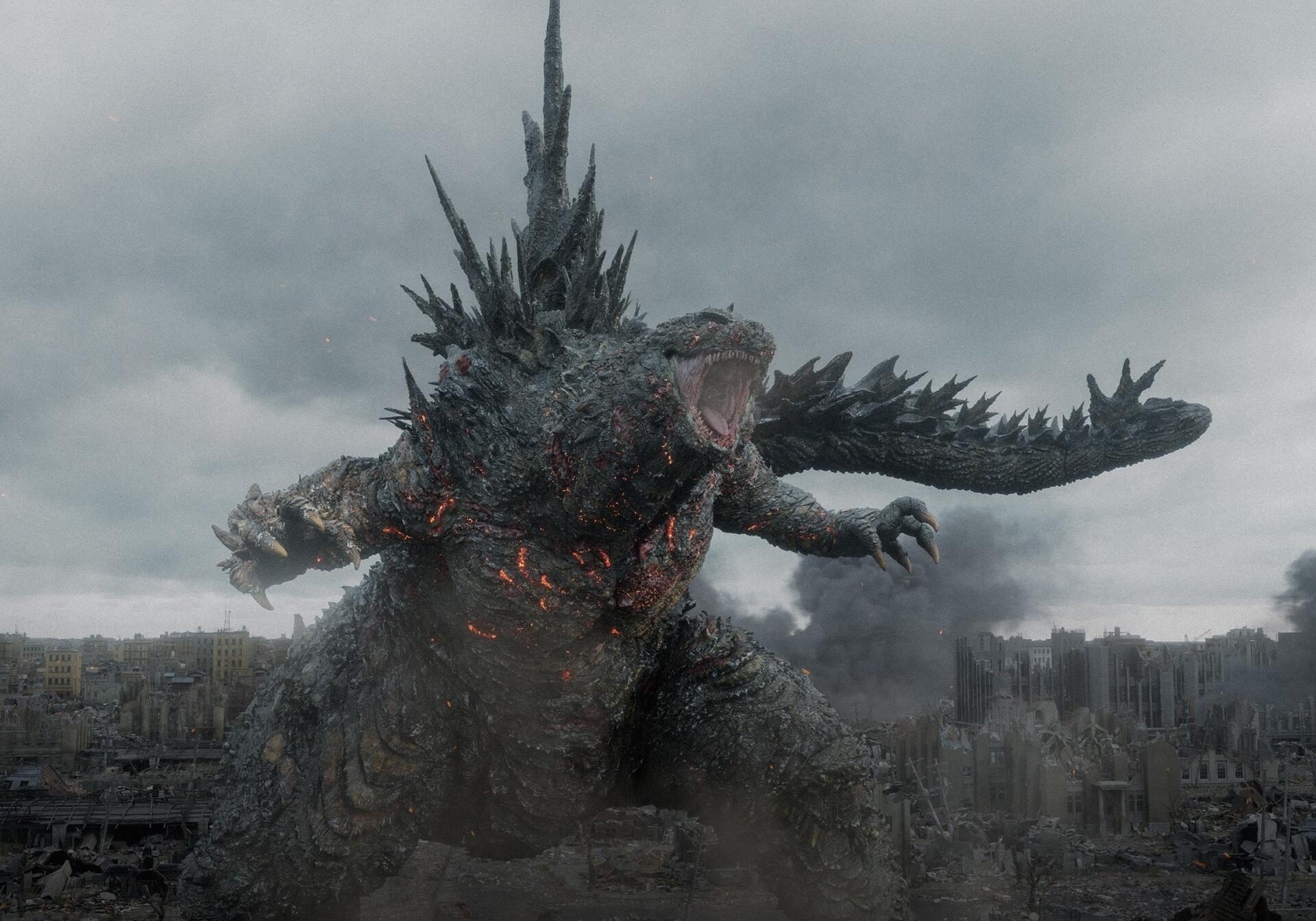 Godzilla Minus Zero towers over a ruined city beneath a stormy sky in this HD desktop wallpaper.